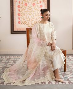 Material - Fabric - Korean Raw Silk Embroidered Shirt | Shaded Organza Embroidered Dupatta | Raw Silk Trousers You will receive - Ready to wear Pant Kameez with Dupatta Size Guide The Size Of The Garment Ready On The Chest, Sizes In Inches Will Be The Following, (XS-34), (S-36), (M-38), (L-40), (XL-42), (2XL-44), (3XL-46), (4XL-48) Care Instructions - The first wash of the garment should always be Dry-Cleaned Note Due to the light and screen setting difference, the item's color may be slightly different from the pictures. Personal Msg from the owner:  I hope you love your item! Thank you for shopping with me and I hope you have a great experience with what you bought. Please don't hesitate to reach out with any questions or concerns. Return Policy: Thank you for shopping with us! We want t Pink Tissue Silk Salwar Kameez With Resham Embroidery, Pink Anarkali Lawn Suit In Jamawar, White Chinon Dupatta With Dabka Detail, Organza Dupatta In Pink With Dabka Work, Pink Organza Dupatta With Dabka Work, Eid Salwar Kameez With Resham Embroidery In Tissue Silk, Pink Lawn Suit For Wedding And Diwali, Pink Organza Salwar Kameez With Straight Kurta, Pink Tissue Silk Salwar Kameez With Dabka