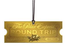 the polar express's round trip luggage tag is hanging from a string on a white background