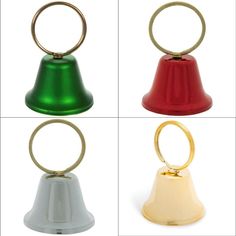 four different colored bells with rings on them