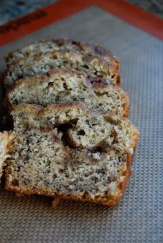 slices of banana bread sitting on top of a mat