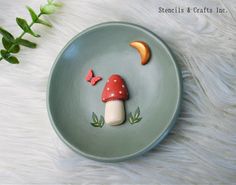 a plate with some food on it and a butterfly sitting on top of the plate