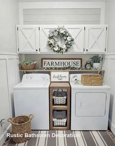 a white washer and dryer sitting next to each other in a laundry room