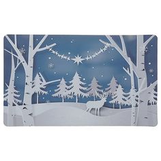 a paper cutout of a deer in the woods at night with stars and snowflakes