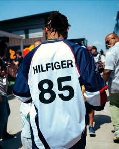 the back of a man's jersey that reads hilliger 855 on it