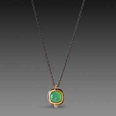 This necklace features a sparkling, faceted chrysoprase, wrapped in warm 22k gold and accented with a tiny diamond. Oxidized sterling silver chain, and sterling silver back. Chrysoprase stone measures approximately 1/4 inch x 1/4 inch. Matte finish. This piece will be made to order, and will ship within 10-14 business days. If you need it sooner, use the Notes section on the order form to request a rush. Chrysoprase Necklace, Pink Soap, Necklace With Diamond, Tiny Diamond, Order Form, Oxidized Sterling Silver, 22k Gold, Leather Design, Sterling Silver Pendant