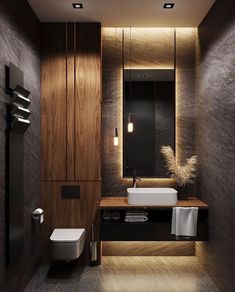 a modern bathroom with dark wood and white fixtures