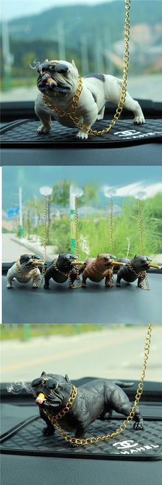 an animal is chained to the back of a car's dashboard with chains on it