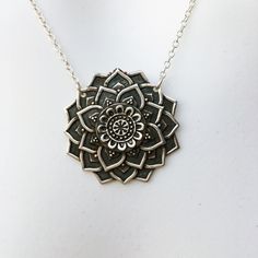 "Chunky Mandala Necklace. Lovely thick silver with a smooth back. Sterling Silver Charm 1.25\" x 1.25\" on delicate sterling silver chain. Chain is 16\" + 1.5\" extender chain to adjust to your desired length with lobster claw. Extender chain is finished with a tiny 4mm Majestic Blue Swarovski Crystal Cube. Necklace is packaged in a 3.5\"x3.5\" white jewelry box on a stiff blue jewelry card. Free polishing cloth and sticker included. Makes a perfect gift! -eva949-" Nickel-free Sterling Silver Medallion Necklaces, Silver Sterling Silver Large Pendant Jewelry, Antique Silver Flower Pendant Necklace In Sterling Silver, Sterling Silver Flower Pendant Necklace In Antique Silver, Antique Silver Sterling Silver Flower Pendant Necklace, Silver Chain Medallion Necklaces For Gifts, Medallion Necklaces With Silver Chain For Gifts, Medallion Necklace With Silver Chain For Gifts, Spiritual Sterling Silver Necklaces With Oxidized Finish