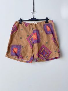 ITEM DESCRIPTION 70s Vintage,   Jams surf line Hawaii shorts. made in USA. Brand : Vintage - Jams surf line Hawaii  Size :  L Color : Multi MEASUREMENTS (Measured in inches on a flat surface) Wasit (Not on flat)  : 32 - 37 Inseams : 7 Length : 17.5 "good condition," Retro Swim Trunks With Built-in Shorts, Bermuda Surfing Shorts For Summer, Relaxed Fit Surfing Shorts, Relaxed Fit Surfing Shorts With Elastic Waistband, Summer Surfing Shorts, Retro Summer Shorts, Summer Shorts For Surfing In Warm Weather, Retro Surfing Bottoms For Summer, Relaxed Fit Surfing Shorts Beachwear