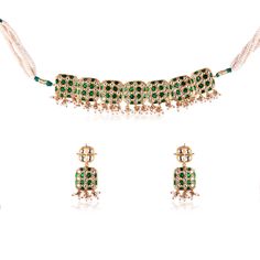 The choker features a beautiful lattice frame, intricately crafted with premium quality semi-precious polkis and green stones set in the traditional Jadau craft style. The lattice work creates a stunning visual effect, adding dimension and depth to the design. The choker is expertly gold plated, giving it a luxurious and elegant finish. The adjustable chain ensures that the choker fits comfortably around the neck, and the push-back closure ensures that the earrings stay securely in place. The ea Green Stones, Choker Set, Drops Design, Green Stone, Visual Effects, Stone Settings, Lattice, Semi Precious, Gold Earrings