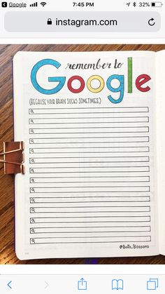 an open notebook with the google logo on it, sitting on top of a wooden table