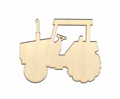 a wooden cutout of a tractor