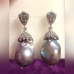 13-15mm Gray Cultured Freshwater Pearl. .85ctw Pear Shape Labradorite And 1.85ctw Round White Topaz Rhodium Over Sterling Silver Earrings. Measures Approximately 1.56"Lx0.50"W, With Push Back Backings. Color/Shape/Size Varies. No Longer Available In Stores. Selling Late Mother-N-Law's Items. Feel Free To Make Offers Pear-shaped Pearl Gemstone Earrings For Formal Occasions, Elegant White Gold Pearl Earrings With Gemstone, Formal Pear-shaped Pearl Gemstone Earrings, Luxury Silver Earrings With Gemstone Accents, Silver Pear Shaped Jewelry For Formal Occasions, Formal Silver Pear-shaped Jewelry, Formal Pear-shaped Silver Jewelry, Luxury Sterling Silver Pear Earrings, Luxury Silver Pearl Drop Earrings