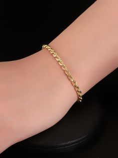 Truly an everyday classic. Our essential Cuban chain bracelet sits comfortably around your wrist, while elevating your style no matter what you pair it with. Elegant Cuban Link Bracelet For Everyday, Elegant 14k Gold Curb Chain Bracelets, Elegant 14k Gold Cuban Link Bracelet For Everyday Wear, Elegant Adjustable Gold Bracelet With Curb Chain, Elegant Everyday Gold Curb Chain Bracelet, Elegant 14k Gold Tarnish-resistant Cuban Link Bracelet, Elegant 14k Gold Tarnish Resistant Cuban Link Bracelet, Elegant Everyday Cuban Link Bracelet, Elegant Gold Bracelet With Curb Chain