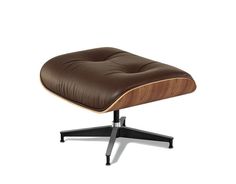 the eames lounge chair and ottoman is shown in brown leather