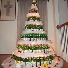 a christmas tree made out of beer bottles