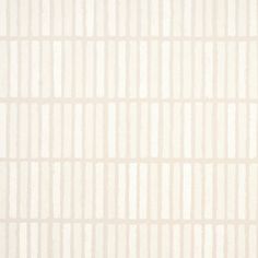 a white wall with vertical lines painted on it