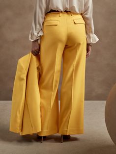 From boardroom to cocktail bar, this wide-leg trouser will have you feeling confident with an exquisitely tailored fit and a not-too-wide leg.  Crafted from a timeless all-season wool fabric from Italian mill Marzotto.  WIDE LEG FIT: High-waisted.  F Wool Wide Leg Pants For Workwear In Spring, Spring Wool Wide Leg Pants For Workwear, Spring Wool Wide Leg Workwear Pants, Formal Wool Wide Leg Pants For Spring, Chic Tailored Full-length Pantsuit, Chic Tailored Wide Leg Pants For Office, Chic Tailored Semi-formal Dress Pants, Chic Tailored Dress Pants For Semi-formal Occasions, Chic Wide Leg Dress Pants With Pressed Crease