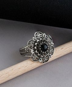 Handmade Silver Black Onyx Gothic Flower Ring, 925 Sterling Vintage Filigree Floral Statement Ring, Emo Daisy Flower Goth Women Ring Greek Ring Jewelry, Feminine Ring, gothic sytle ring Black Onyx Gemstone Dimensions: 6 mm, Round FAST, FREE AND TRACKABLE DELİVERY FOR ALL STORE. The handmade silver black onyx Gothic flower ring you described is a statement piece of jewelry that features a vintage filigree floral design with a black onyx stone set in 925 sterling silver. The ring is designed to ev Greek Ring, Gothic Flowers, Silver Flower Ring, Filigree Jewelry, Goth Women, Black Onyx Stone, Black Onyx Ring, Tiny Diamond, Women Ring