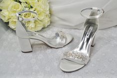 the bride's shoes and bouquet are ready for her big day