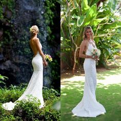 two women in wedding dresses standing next to each other and one is holding a bouquet