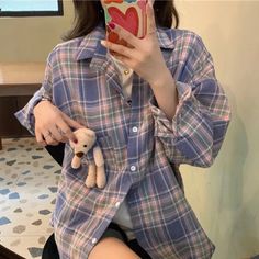 Eye-catching plaid flannel shirt featuring a bear plush design in pink and purple stripes, perfect for Y2K style outfits