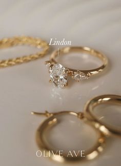 14K Yellow Gold | Lindon features an elegant oval center stone with kite shape accent stones set traditionally on a half round shank. Wedding Diys, Ring Inspo, Dream Engagement, Dream Engagement Rings, Girly Accessories, Ring Ideas, Pretty Rings, Jewelry Companies, Dainty Jewelry