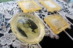 an image of a woman on some glass plates