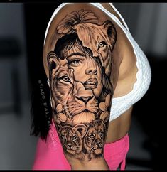 a woman's arm with a lion and lions tattoo on the left side of her body