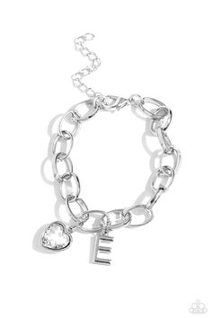 A simple collection of silver charms — including a white rhinestone heart pressed in a silver frame and a sleek letter "E" — dance from a chunky silver chain around the wrist, creating a sentimental fringe. Features an adjustable clasp closure. Sold as one individual bracelet. Latest Jewellery Trends, Mixed Metal Jewelry, White Bracelets, Letter E, Rhinestone Heart, Paparazzi Accessories, Latest Jewellery, White Rhinestone, Paparazzi Jewelry