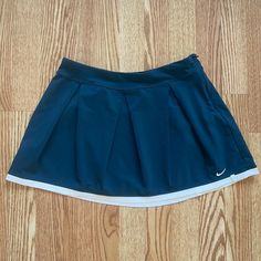 Vintage Nike Dri Fit Tennis Skirt Sz: S Color: Navy Blue (White Outline) Never Worn, Brand New Nike Blue Skort For Spring, Nike Casual Tennis Skirt, Vintage Nike Skirt, Nike Summer Short Tennis Skirt, Blue Sporty Tennis Skirt, Cheap Blue Mini-length Tennis Skirt, Nike Skirts, Tennis Fits, Skirts Vintage