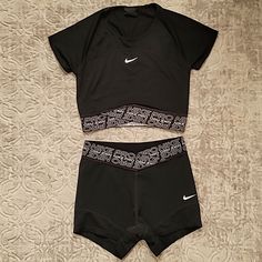 Nike Pro Intertwist Training 2 Piece Set, Shorts, And A Matching Short Sleeve Crop Top. Shorts Are A Size Small, And The Top Is Extra Small But Has Some Stretch, So It Would Also Fit A Regular Size Small. Both Are In Great Used Condition. This Is A Great Workout Set And Very Comfortable! These Are No Longer Sold, Dead Stock. Selling As A Set! Shorts Nike, Workout Sets, Nike Pros, Short Sleeve Cropped Top, Shorts Athletic, Athletic Shorts, Black Nikes, Nike Women, Womens Shorts