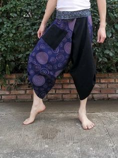 Item details Materials cotton,  hmong fabric, thai, japanese print FEATURE: Handmade Ethically, Breathable, Unisex, Comfortable to Wear & Stylish. indigo MATERIAL: 100% Cotton, Handmade  COLOR: Black Sizing : Tie Waist or Wrap pants Waist up to : 21 inch 44 inch ( 53.36 -111.75 cm ) Hip up to : 64 inch ( 142 cm ) Length     : 34 inch ( 78 Cm ) 1 Pocket Special Promotion  -Shipping by priority mail to USA Next all item get Free priority mail to USA  Non USA shipping by Air Mail registered. GENDER: M/F This beautiful samurai pants is unique & comfortable to wear. Handmade with very lovely pattern, it is easy to wear and great for many occasions. Unique handmade embroidered waist patches are made with Cotton fabric, each pair are a slight different which makes them an one-of-a-kind. One size Black Patchwork Bottoms For Festival, Casual Purple Pants For Festival, Bohemian Purple Bottoms With Pockets, Hmong Fabric, Mens Summer Pants, Samurai Pants, Cotton Harem Pants, Fisherman Pants, Pants Comfy