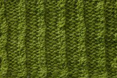 the green knitted fabric is very close to it's surface and looks like an interesting pattern