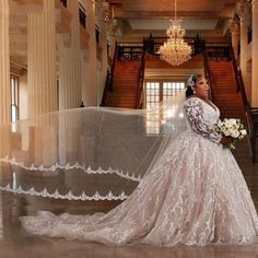 a woman in a wedding dress holding a bouquet