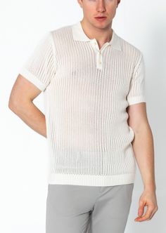 Introducing our Openwork Knit Polo Tee, a stylish and sophisticated addition to your wardrobe. Crafted from high-quality openwork knit fabric, this polo tee features intricate detailing that adds texture and visual interest. The openwork knit construction provides breathability and comfort, making it ideal for warmer weather. The polo collar adds a touch of elegance, while the short sleeves offer versatility and ease of movement. With its tailored fit and attention to detail, this polo tee is pe Spring Pointelle Knit Top With Polo Collar, Casual Polo Collar Top With Pointelle Knit, Casual Tops With Pointelle Knit And Polo Collar, Casual Pointelle Knit Top With Polo Collar, Classic Textured Knit Polo Sweater For Summer, Spring Polo Sweater In Pointelle Knit, Casual Tops With Pointelle Knit And Collared Neckline, Casual Pointelle Knit Tops With Collared Neckline, Casual Collared Pointelle Knit Tops