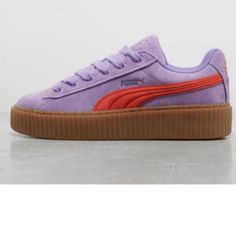 Elevate Your Style With The Women's Creeper Phatty Sneakers, The Latest Collaboration Between Puma And Rihanna's Fenty. These Sneakers Feature An Attention-Grabbing Gum Platform Sole, While The Premium Materials And Iconic Puma Formstrip Add A Touch Of Luxury. In A Black Colourway, These Versatile Trainers Blend Comfort With Avant-Garde Style. Whether You're Into Athleisure Or Making A Statement, These Sneakers Are The Perfect Fusion Of Fashion And Function. Condition Is New In Box Purple Puma Sneakers With Round Toe, Purple Low-top Puma Sneakers, Purple Low-top Sneakers With Puma Logo, Red Puma Suede, Fenty Creepers, Puma Basket Classic, White And Gold Sneakers, Black Platform Sneakers, Puma X Fenty