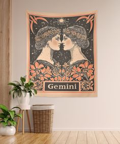 a wall hanging with an image of two women kissing