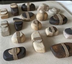 many different types of rocks are laid out on a table