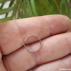 Simple and delicate belly button hoop ring. It comes in 14k goldfilled or 925 sterling silver and its nickel-free. A small opening in the hoop that you twist open to put on and close once in. ★Available Gauge: 20(0.8mm), 18 (1mm) in 8mm, 10mm or 12mm diameter. ★Note: Please Choose Accurate size for your piercing The perfect gift for you or your loved ones. 🔸🔸BELLY BUTTON ARE FINAL SALE DUE TO HYGIENIC REASONS🔸🔸 In the picture: 20g - 12mm ★Packaging All items are packed in an elegant jewelry Dainty Hypoallergenic Toe Ring Jewelry, Dainty Small Hoop Gold Rings, Yellow Gold Sterling Silver Nose Rings For Gifts, Yellow Gold Sterling Silver Nose Rings As Gift, Hypoallergenic 14k Gold Round Midi Rings, Minimalist Small Hoop Yellow Gold Ring, Minimalist Yellow Gold Small Hoop Rings, 14k Gold Circular Metal Ring, Internally Threaded Round Nose Rings As Gift