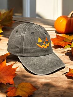 This has to be the finishing touch for your Halloween-inspired look! It is made of a distressed washed grey fabric and a vibrant orange embroidery stitching. The cap is adjustable on the back and the extra fabric can be easily tucked into its hidden compartment. The orange jack o'lantern design is such an iconic staple for the season and we know you'll be getting compliments along the way! One size fits all Adjustable strap Unisex Distressed Gray Baseball Cap One Size, Distressed Gray Baseball Cap, One Size, Halloween Cotton Cap, Cotton Halloween Cap, Halloween Cotton Hat, Casual Halloween Baseball Cap With Curved Brim, Halloween Outdoor Cap Hat, Adjustable Cotton Hat For Halloween, Adjustable Cotton Halloween Hat