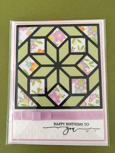 a birthday card with flowers on it