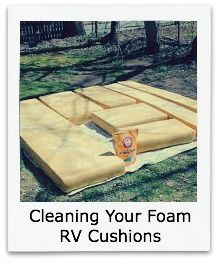 the foam mattress is laying on top of the grass and has words describing cleaning your foam rv cushions