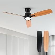 a black ceiling fan with wooden blades in a white room