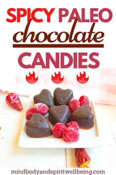 chocolate hearts with raspberries on a white plate and the words spicy paleo chocolate candies