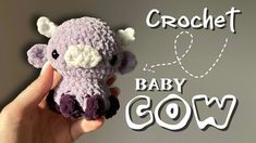 a crochet baby cow is held up in front of a gray background with the words crochet 20