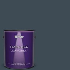 a purple paint can with the words marquee on it's bottom half