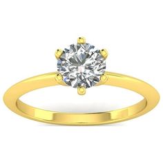 a yellow gold engagement ring with a round diamond in the center, on a white background