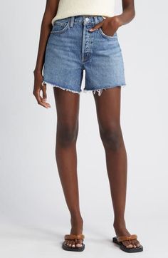 A relaxed, laid-back fit and premium nonstretch denim create plenty of vintage attitude on high-rise shorts finished with ragged raw-edge hems. 4" inseam; 26" leg opening; 11" front rise; 15" back rise (size 29) Button fly Five-pocket style 100% cotton Machine wash, tumble dry Made in Turkey Hairstyling Products, Beauty Sale, Distressed Denim Shorts, High Rise Shorts, Nordstrom Store, Free Fabric, Raw Edge, Distressed Denim, Travel Size Products