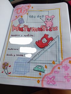 an open notebook with drawings on it